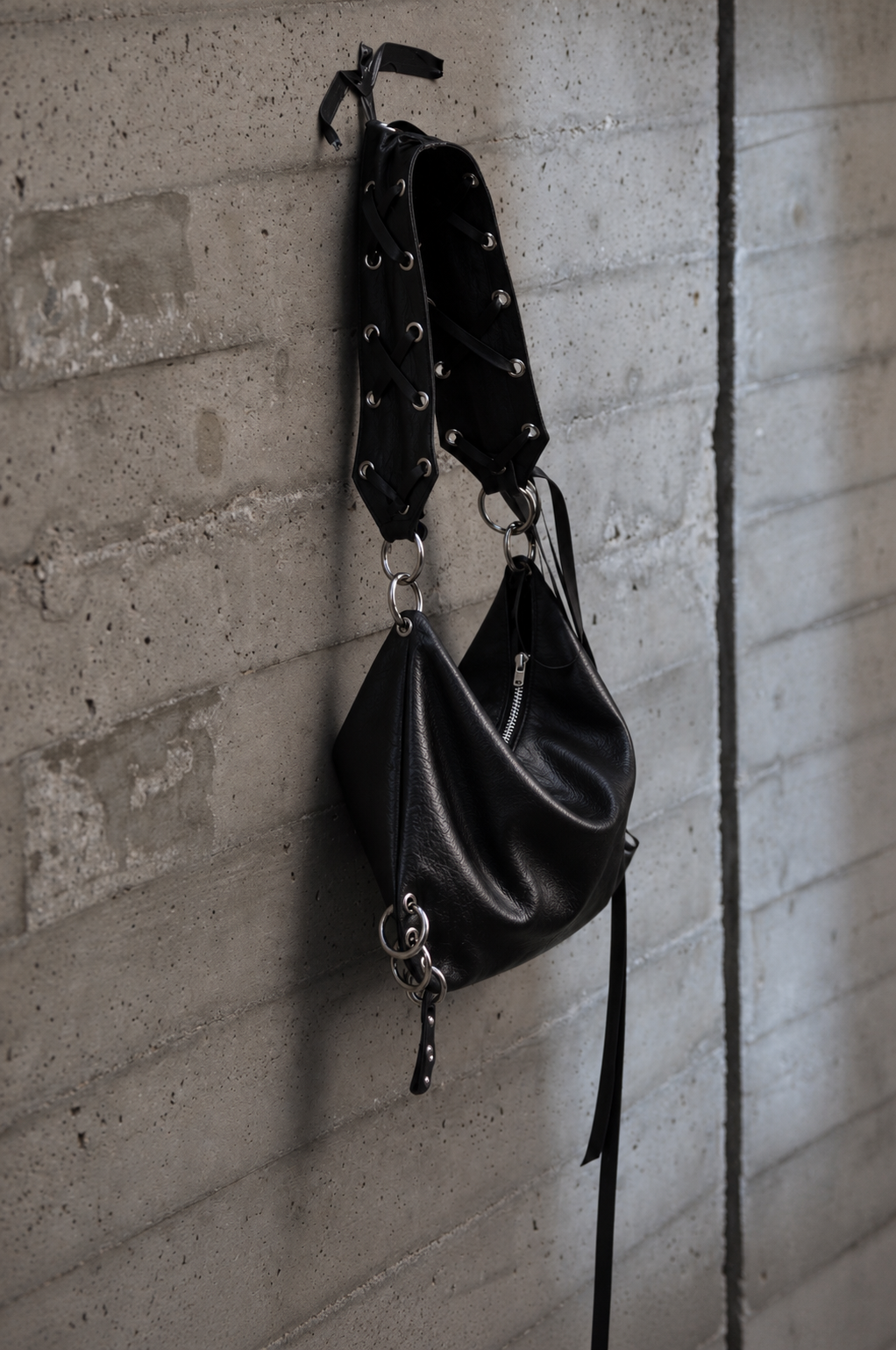 DERAS SIGNATURE FAUX LEATHER BAG