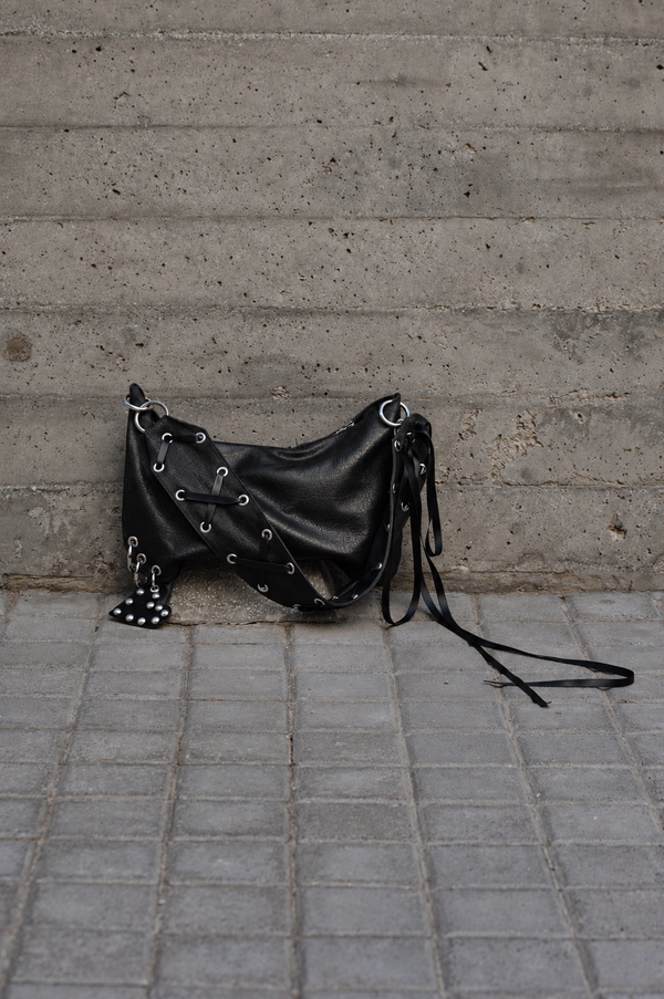 DERAS SIGNATURE FAUX LEATHER BAG