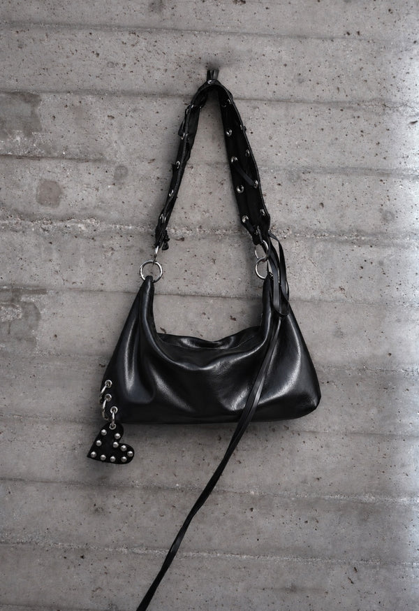 DERAS SIGNATURE FAUX LEATHER BAG